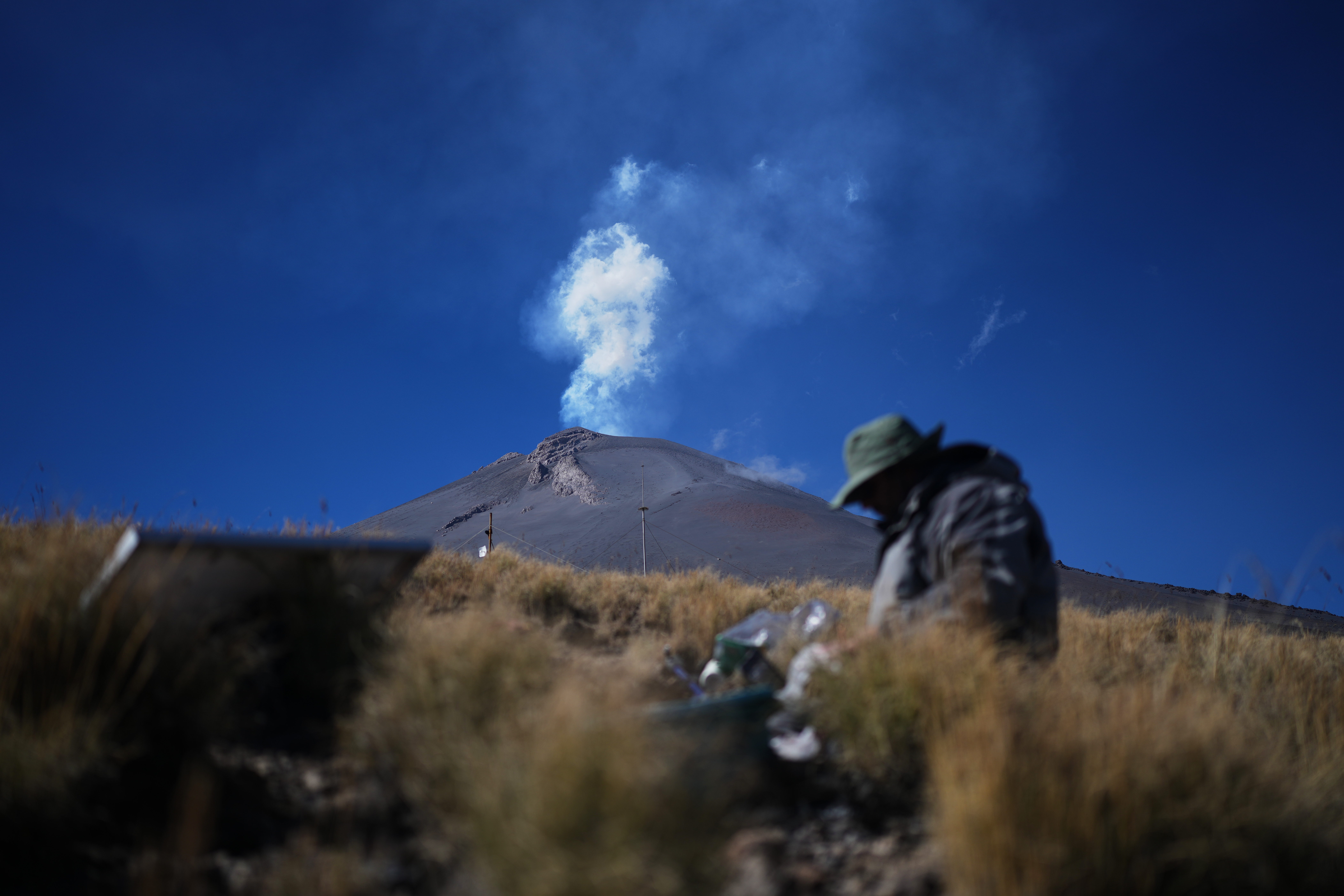 Marco Calò collects information from a monitoring station on the slopes of Popocatépetl