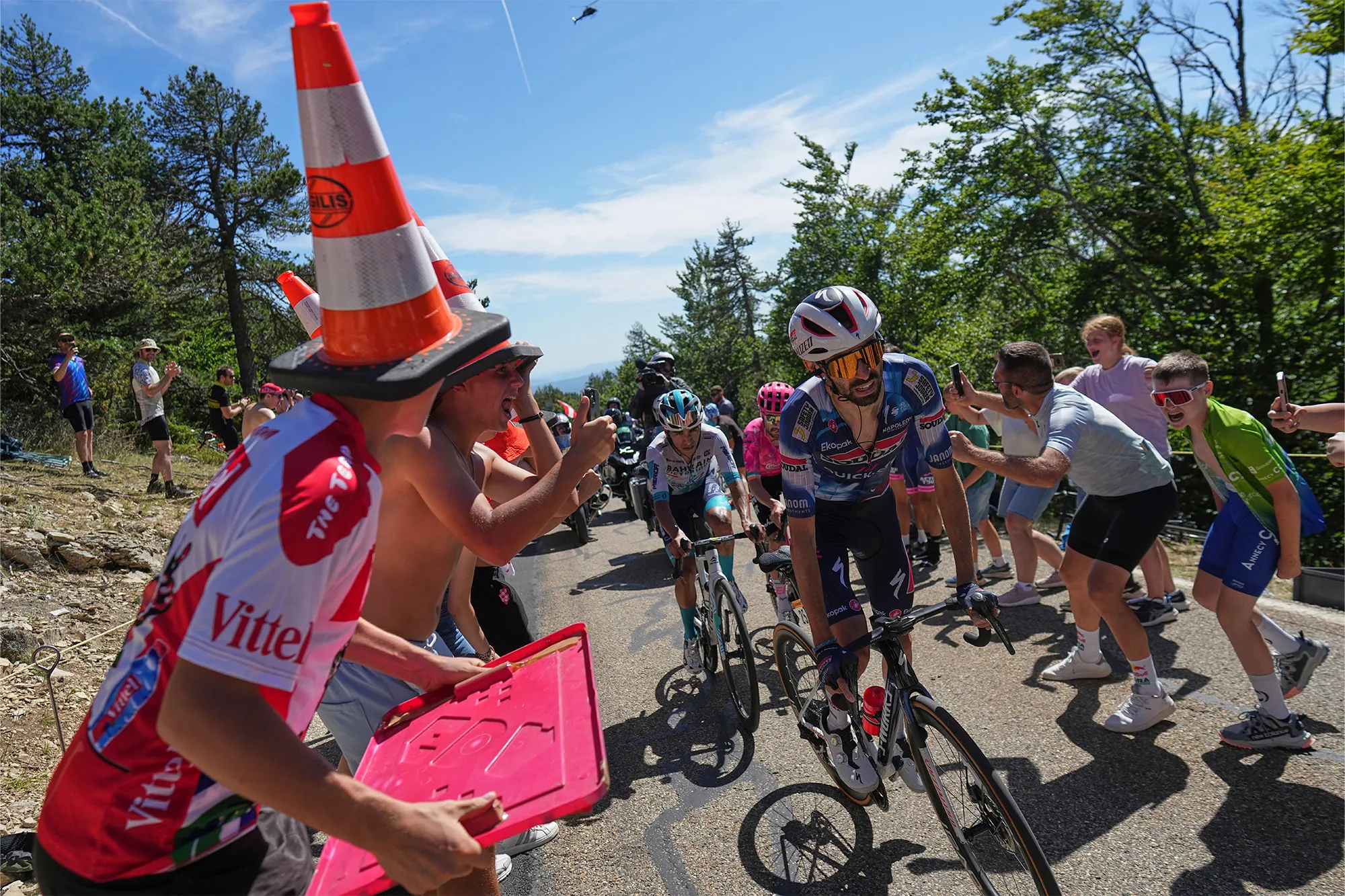 France's Valentin Paret Peintre leads in the breakaway with Ireland's Ben Healy, in pink, and Colombia's Santiago Buitrago, in white.