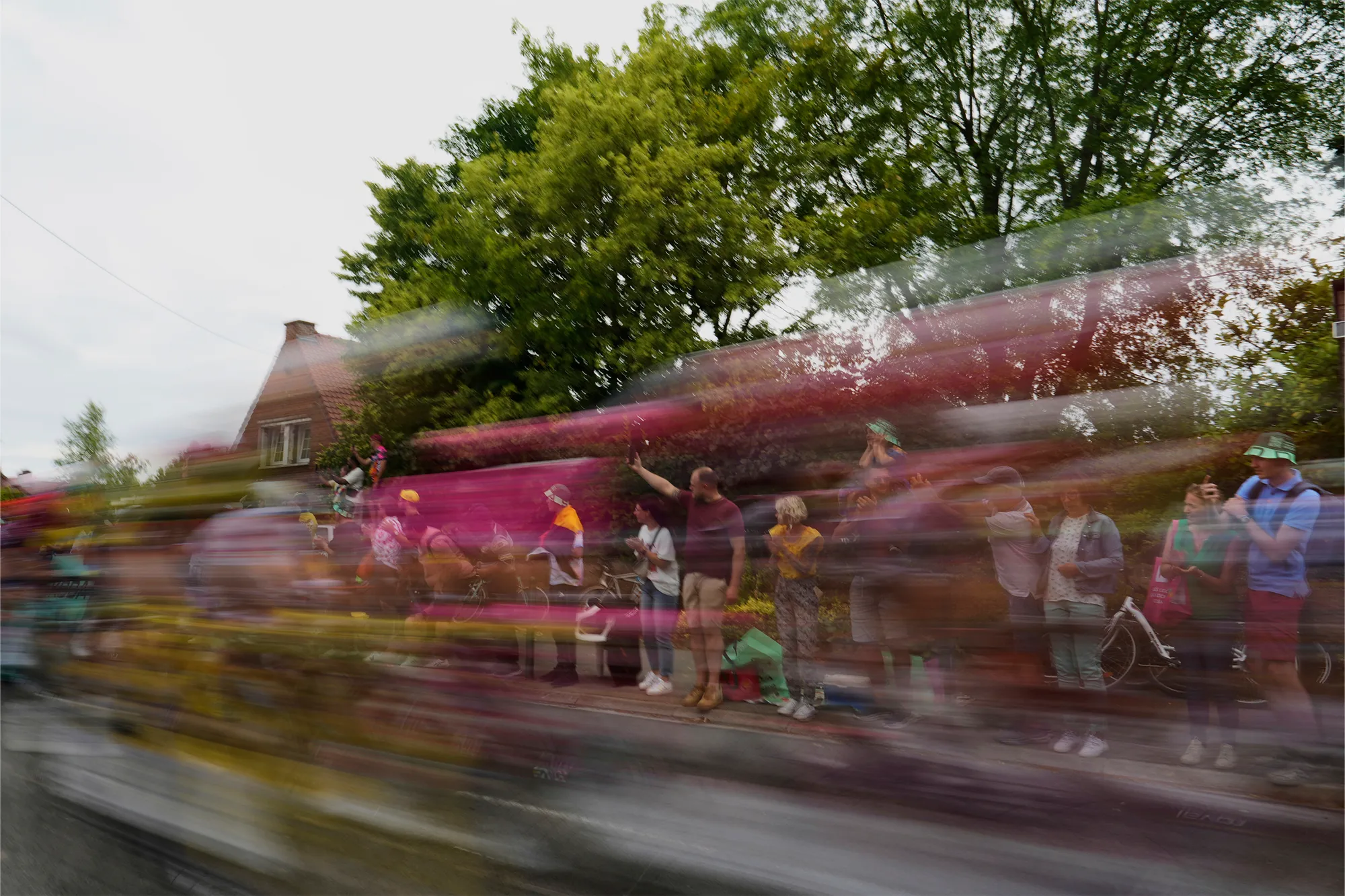 blurred timelapse image of cyclists